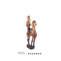 Figure carving, man on horse with rifle