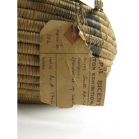 Paper label tied to object (detail 2)