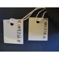 Small recent rectangular paper label tied to object