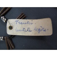 Rectangular parchment label tied to object (view 2)