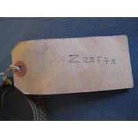 Rectangular brown paper label tied to object (02)