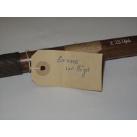 Rectangular brown paper label tied to object (view 1)